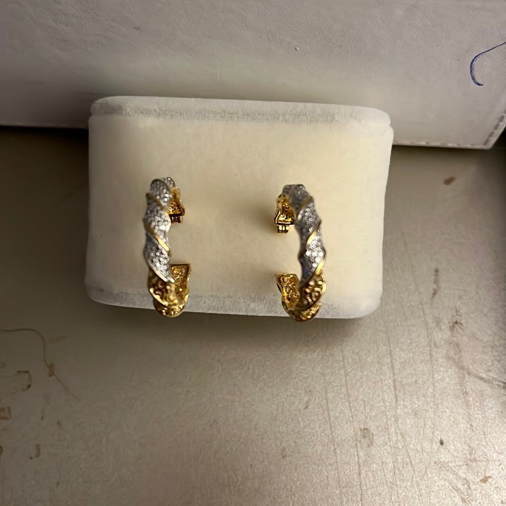 Gold plated cubic zirconia hoops.